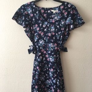 Floral dress with adjustable sides